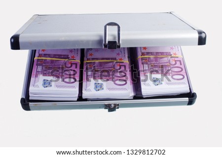 Case with bundles of money on a white background