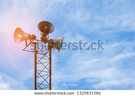 broadcasting and loudspeaker tower megaphone for announcing in community small-scale-image Royalty-Free Stock Photo #1329831386