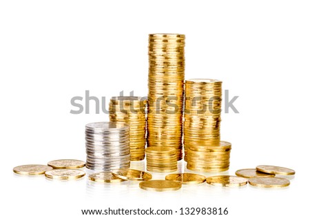 Towers made out of gold and silver coins over white background