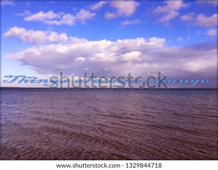 Sea water sky with clouds and quote about things in life