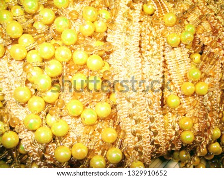 small beads, fringe, tassels