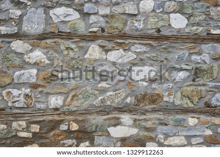 Stone house wall of old house in Olympic riviera, Greece