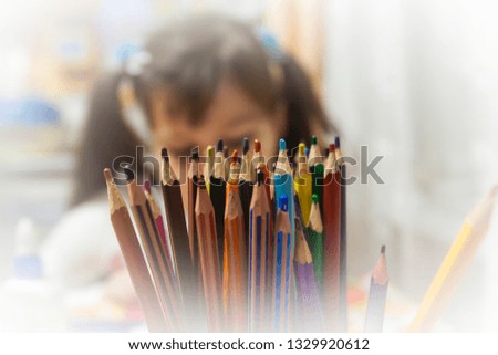 School. Drawing lessons. A lot of pencils in a glass. Picture taken in Ukraine, Kiev region. Horizontal frame. Color image. Soft focus