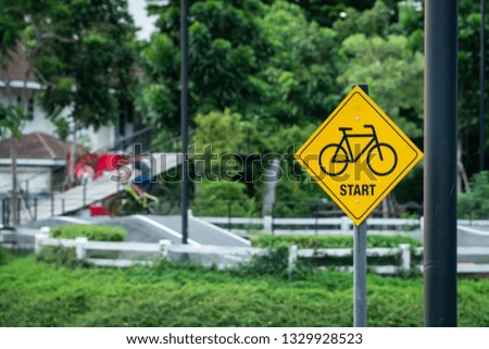 Start bike road sign at park