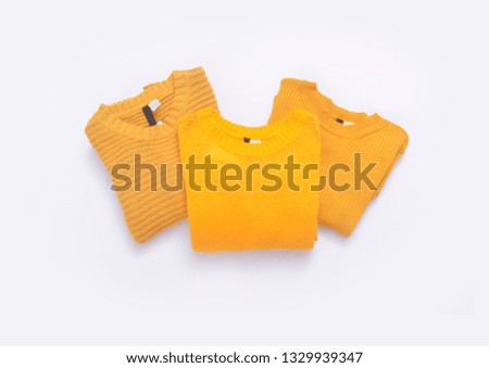 Yellow three yellow three knitted sweater isolated

