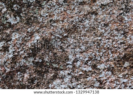 Close up texture of granite walls and rocks in high resolution with cracks and stunning structures