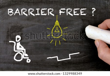 Barrier free environment chalkboard with disabled person and lamp as idea Royalty-Free Stock Photo #1329988349