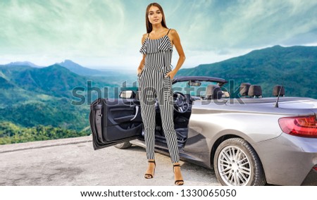 Summer car and slim young woman. Free space for your decoration. Landscape of Madagascar mountains. 