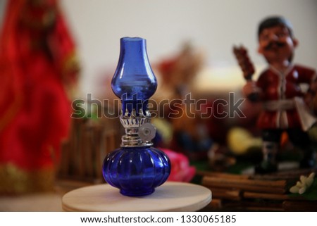 Novruz holiday concept. Blue small lamp and national souvenir of Azerbaijan for Novruz holiday concept