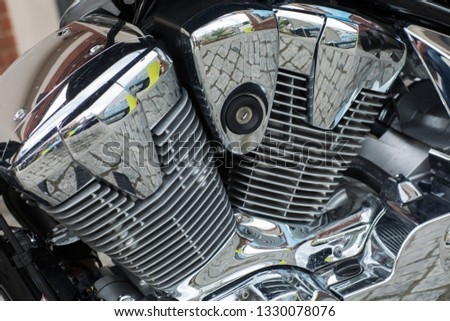Modern powerful motocycle engine .Motocycle engine part with sunlight