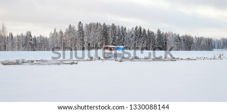 Fresh water fishery on a freezing winter day - Savo region, Finland