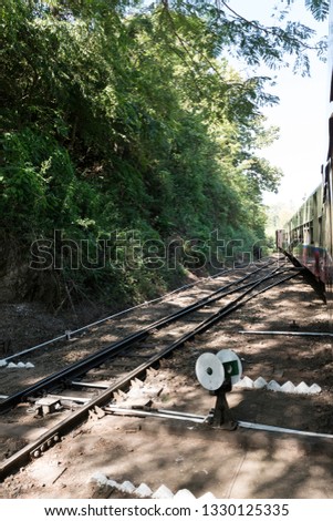 Vertical picture of the old burmese railways with local vegetation on the moutains close to Kalaw, Myanmar