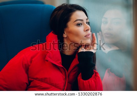 Young female and railway train.