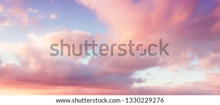 Evening sky with clouds. Golden hours sky. Pink afternoon vanilla sky  Royalty-Free Stock Photo #1330229276
