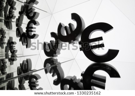 Euro Currency Symbol With Many Mirroring Images of Itself on White Background