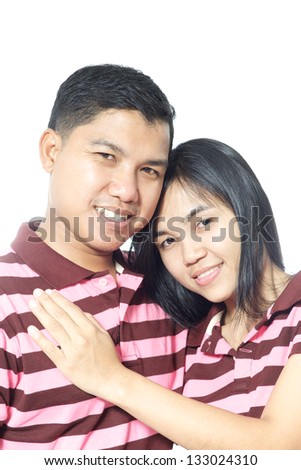 close-up shot of happy attractive asian couple isolated on white background with some bright lens flare
