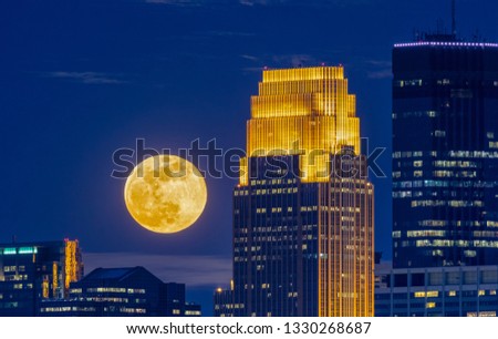 The 2019 Super Snow Moon Rises Over Downtown Minneapolis