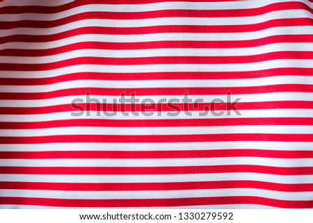Striped red and white striped fabric, background