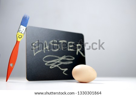  Happy easter blackboard background with funny brush with open mouth in amusement