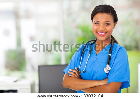 beautiful african american female pediatric nurse in modern office