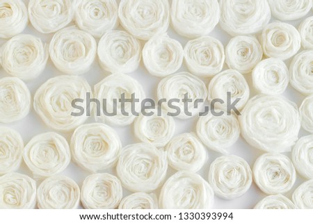 Handmade,stylish paper roses designed on the white background.Women's Day or any special day conceptual background.