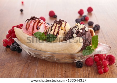 banana split and berries Royalty-Free Stock Photo #133044317