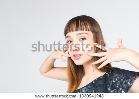 young beautiful girl model posing portraits on a white background in the studio