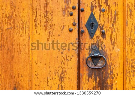 Ancient baroque door detail, Tiradentes, Minas Gerais, Brazil                                
