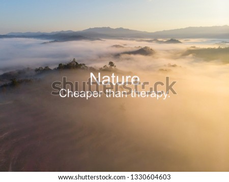 Inspirational life quotes - "Nature Cheaper Than Theraphy" with Nature Aerial landscape view.