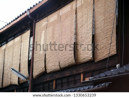 row of Japanese old traditional window wooden curtains