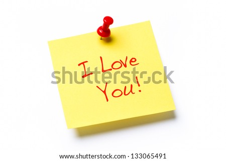 Yellow paper note with the words I Love You, isolated on a white background