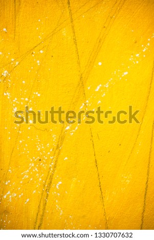 Distressed Grunge Yellow color texture. Empty damaged and scratchy painted background