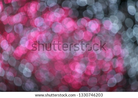 Pink and white bokeh light abstract texture background. Christmas New year and Valentine's pattern bokah, wallpaper.