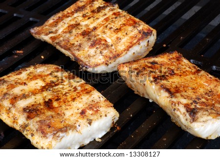 Mahi on the grill at a cookout