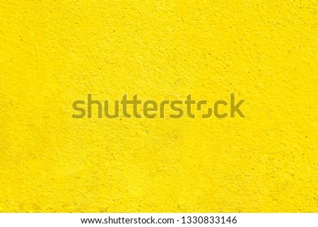 Modern bright with yellow distress concrete of architecture building structure for background with vintage tone.