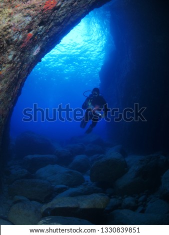 scuba diver in the cave underwater nice light