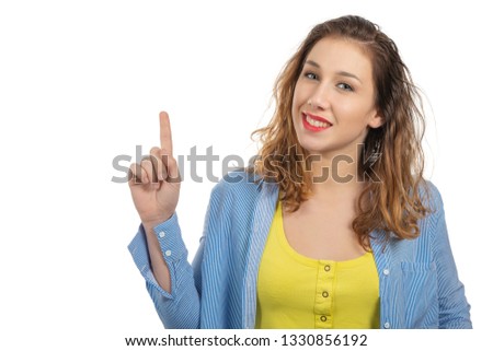 happy smiling young woman showing an empty blank signboard with copyspace