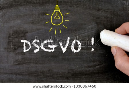 DSGVO in english GDPR european data protection regulation chalkboard black with bright lamp Royalty-Free Stock Photo #1330867460