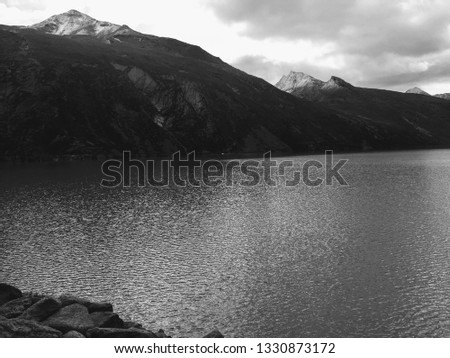 Black and White picture overlooking Mattmark Dam in the Saas Valey.