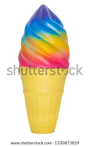colored ice cream in a waffle cone on a white background
