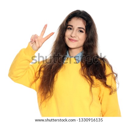 Beautiful young woman in stylish clothes on white background