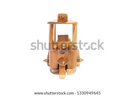 Wooden Tuk Tuk -  Thailand taxi model for souvenir and Decoration. Three-Wheels photo on isolated white background.