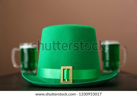 Green leprechaun's hat on table. St. Patrick's Day celebration