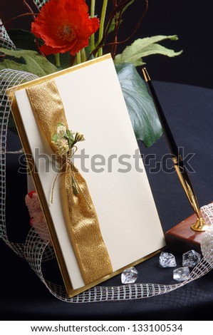Bouquet of flowers on a table, blank card with copy space to add your own message