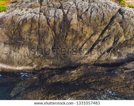 Aerial view of ocean waves and fantastic Rocky coast.