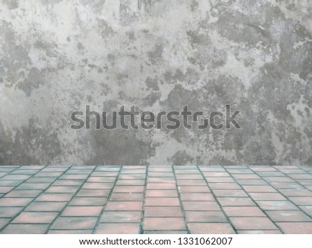 Texture concrete floor with old wall. Studio table room background.