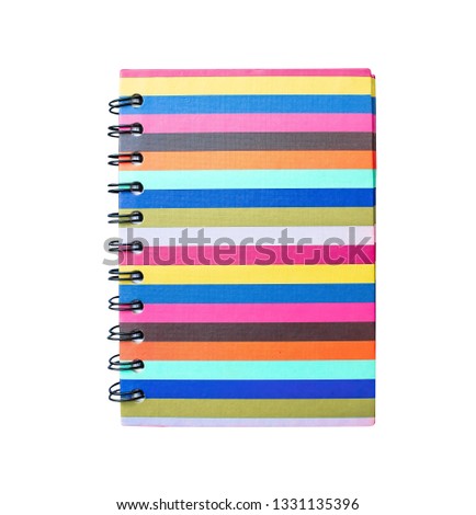 Colorful notebook in multicolored lines patterns isolated on white background with clipping path
