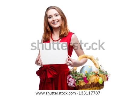 cheerful young woman in red dress holding easter basket and sign isolated on white