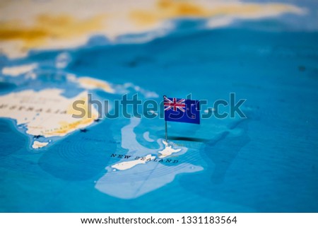 the Flag of new zealand on the cities in the world map