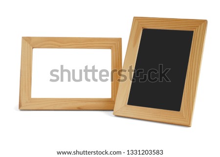 Two simple wooden picture frames isolated on white background. This has clipping path.